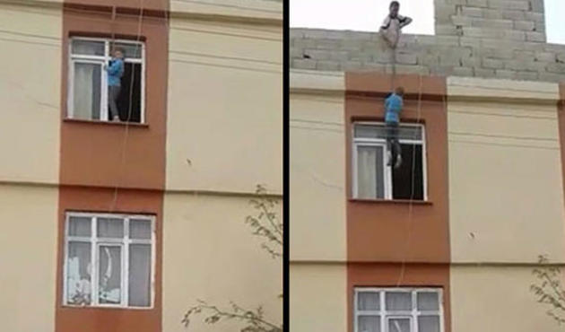 Damdan iple çocuk sarkıttı!