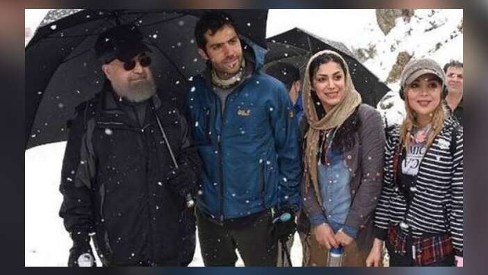 İran Cumhurbaşkanı Ruhani'nin tatil fotoğrafı ortalığı karıştırdı!