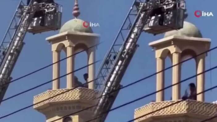 İntihar etmek için minareye çıktı! Dövülerek indirildi...