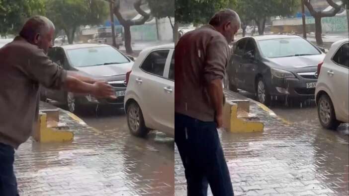 Suya ulaşımın imkansız hale geldiği Gazze'de bir Filistinli yağmur suyuyla abdest aldı