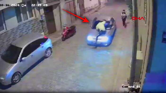 İzmir'de pes dedirten magandalık! Kendisini durdurmaya çalışan polisi kaputta sürükledi...