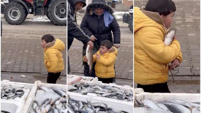 Balık alamadığı için ağlayan küçük çocuğa esnaf balık hediye etti! Boyu kadar balığı kucaklayıp evine götüren çocuğun videosu viral oldu