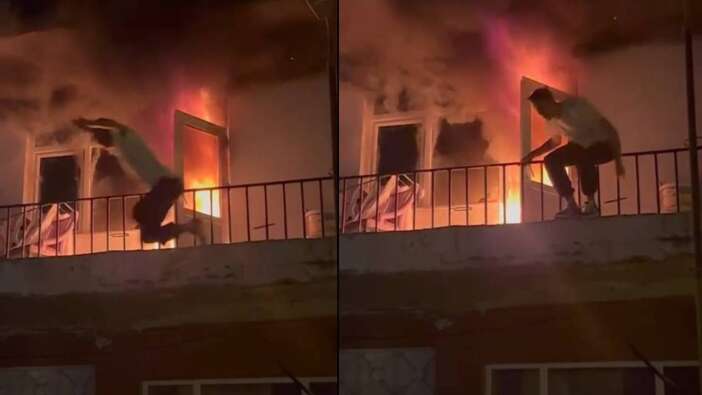 Komşuda çıkan yangına müdahale edeyim derken balkondan atlamak zorunda kaldı