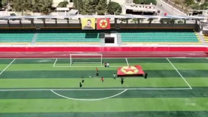 Terör örgütü sporu da propaganda aracına çevirdi! PKK’nın Suriye kolu SDG “Rojava Milli Takımı” kurdu... Stadyuma teröristin ismi verildi...